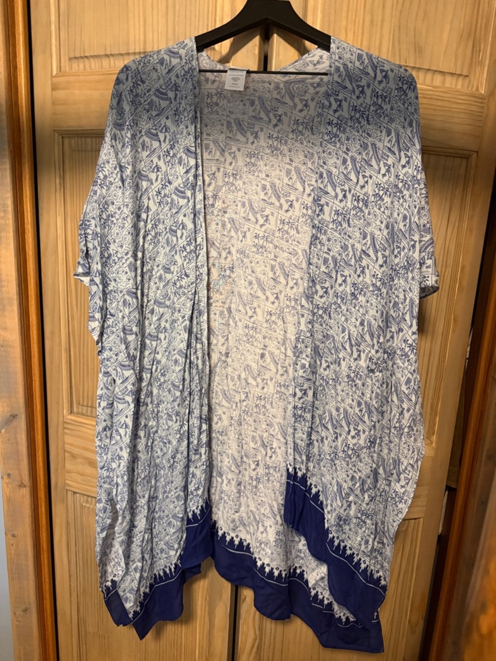 CAbi "Boho Beach Club" cover-up kimono features tropical print